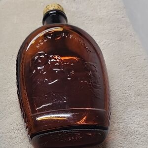 Amber Glass Bottle with Embossed Design